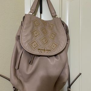 Micheal Kors tan leather backpack w/ gold detail